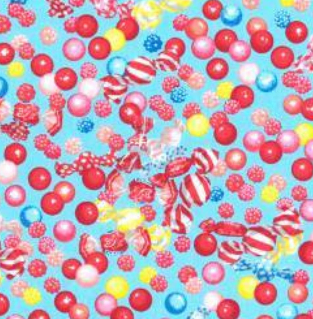 Colorful candy assortment on a blue background