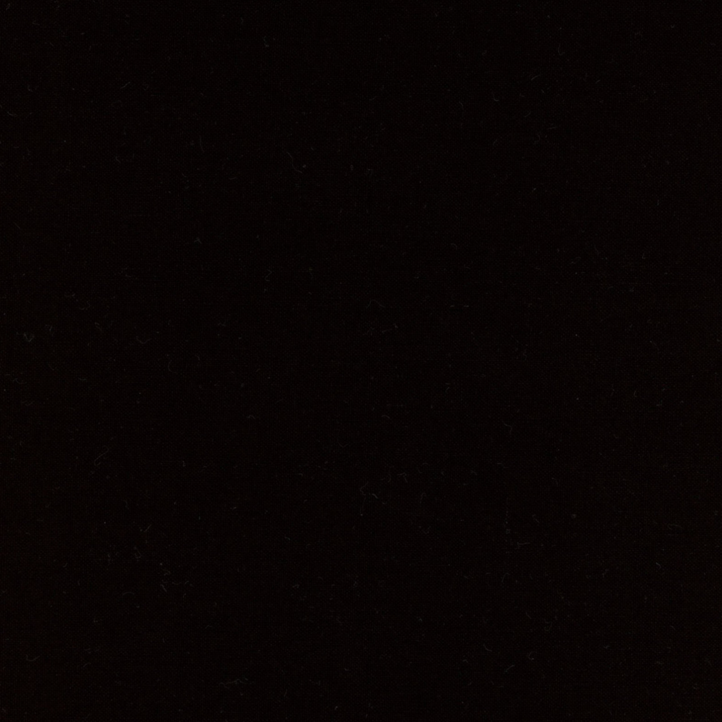 A piece of solid black fabric from Maywood Studio.
