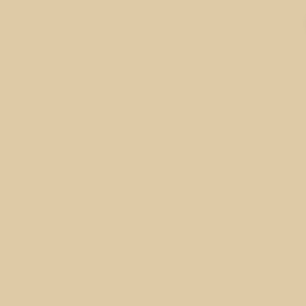 A solid beige fabric swatch labeled 'Northcott ColorWorks Premium Solid 9000 Colour 102 CREME BRULEE'.