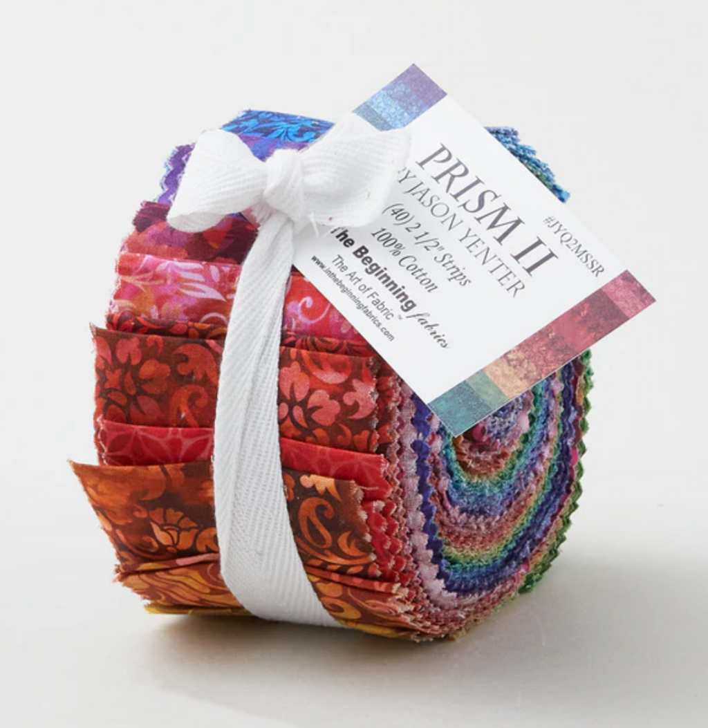 Colorful fabric roll with a label on a white background