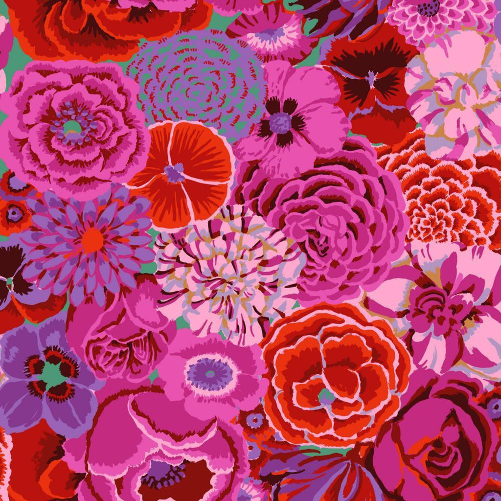 Colorful floral pattern with pink, red, and purple flowers on a green background