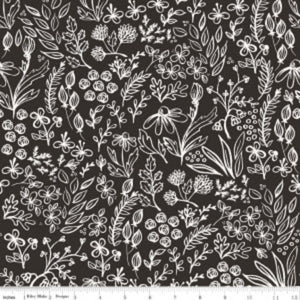 Black fabric with a white floral pattern