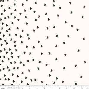 A fabric featuring a white background with a scattered black heart pattern, measuring 112cm in width.
