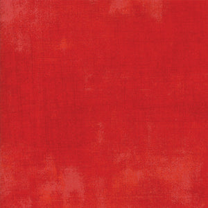 Solid red color swatch with a textured pattern