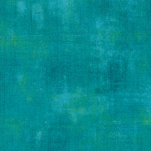 Solid teal color swatch with a textured pattern