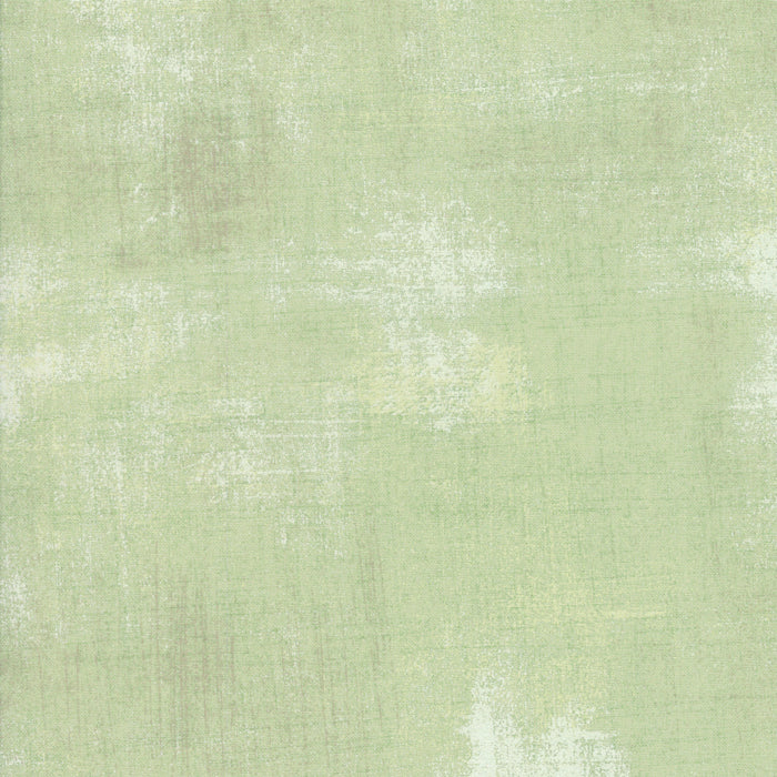 Solid light green color swatch with a textured pattern