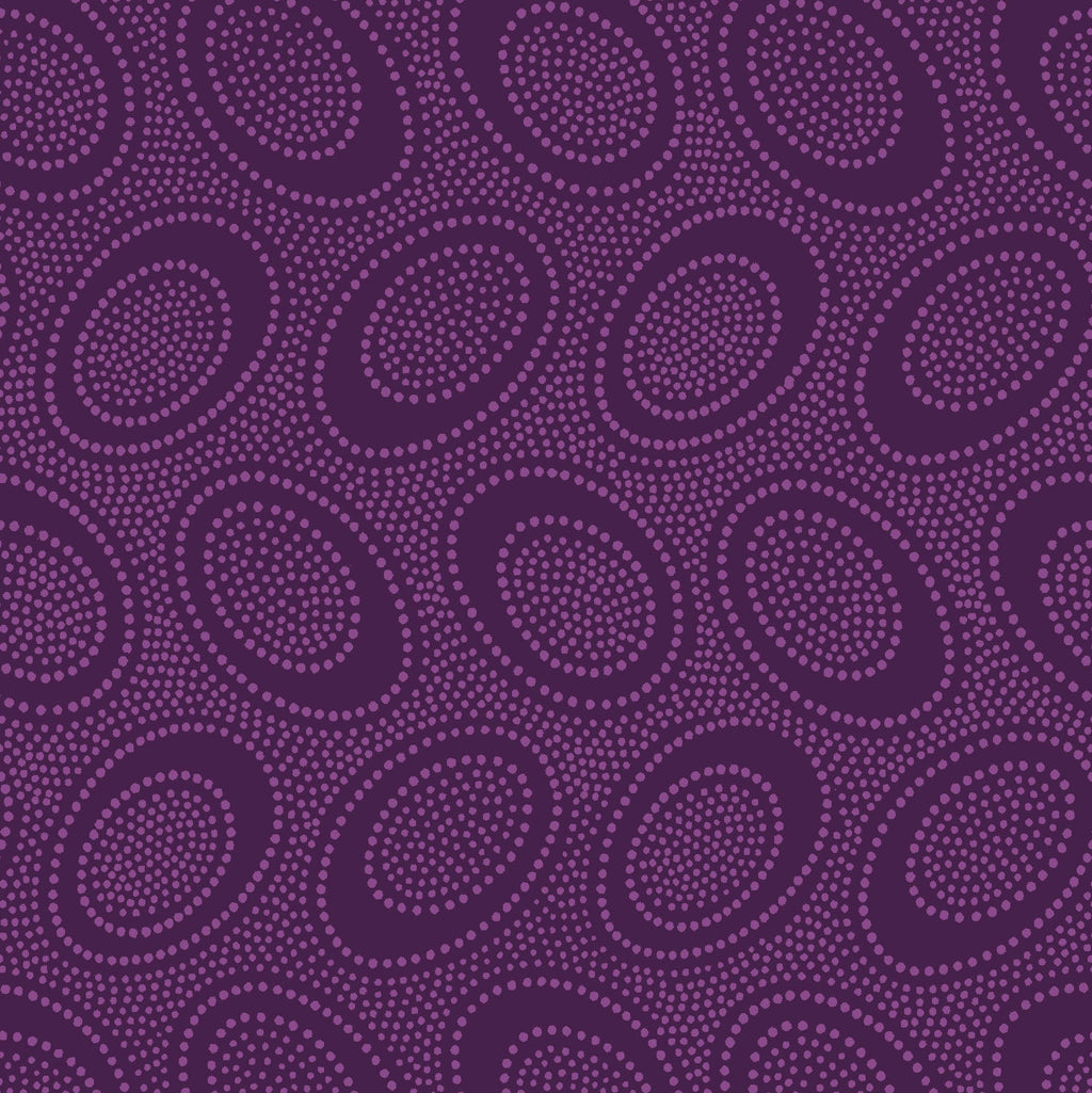 Purple patterned fabric with circular shapes on a purple background