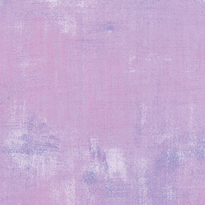 Textured purple background with a subtle pattern
