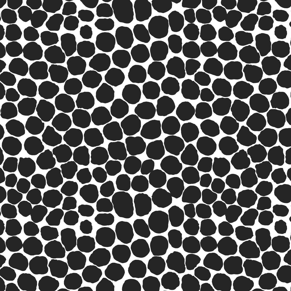 Black and white pattern with irregular black shapes on a white background