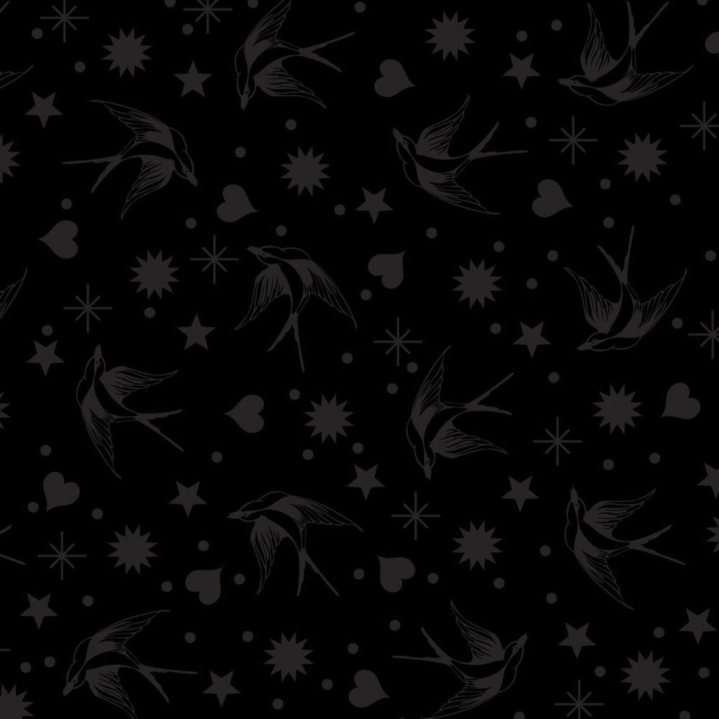 Black and white pattern of birds, stars, and hearts on a black background