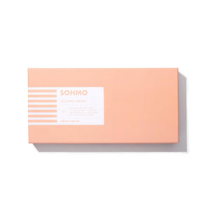 Peach-colored box with a white label featuring 'SOHMO' on a white background