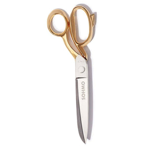 Gold-handled scissors with 'SOHMO' branding on a white background