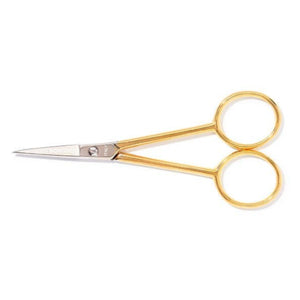 Gold-handled scissors on a white background