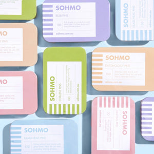 Collection of SOHMO products on a light blue background